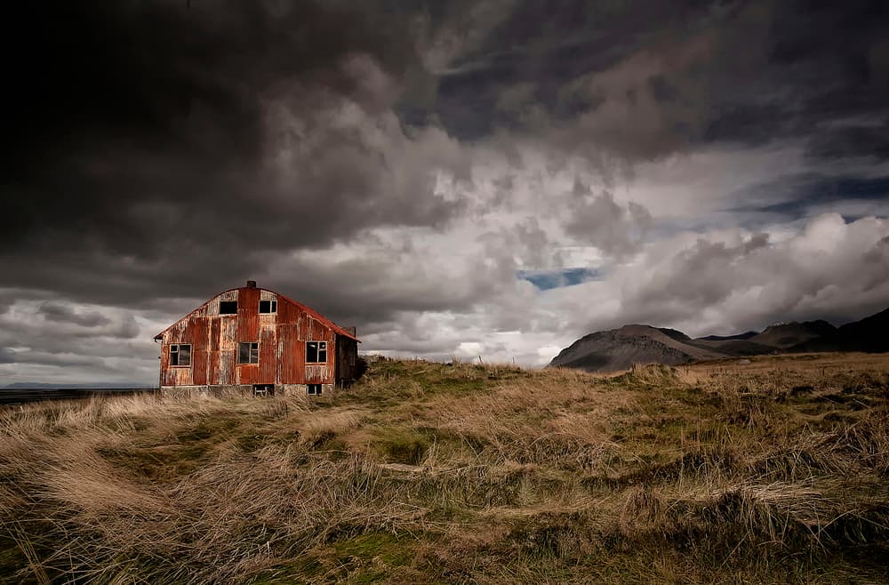 Stormy Red House by Þorsteinn H. Ingibergsson — canvas wall art