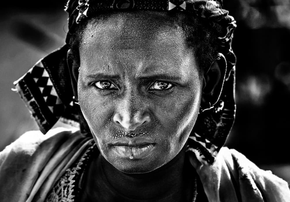 Intense Woman Gaze by Joxe Inazio Kuesta Garmendia — canvas wall art