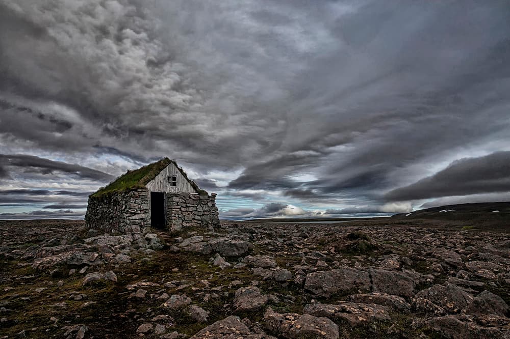 Moody Stone Cabin Landscape by Þorsteinn H. Ingibergsson — canvas wall art