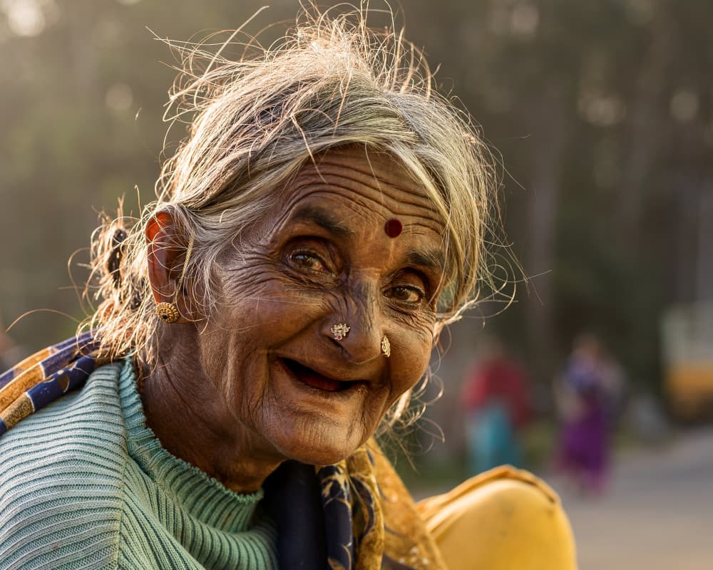 Joyful Indian Elder by HIRAK BHATTACHARJEE — canvas wall art
