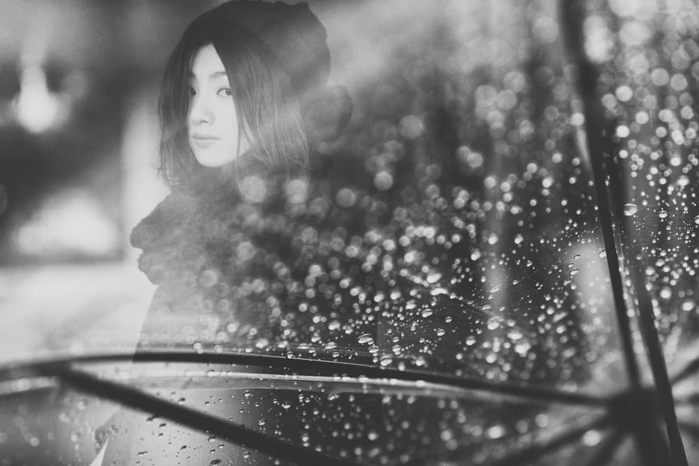 Woman Through Raindrops by Daisuke Kiyota — canvas wall art
