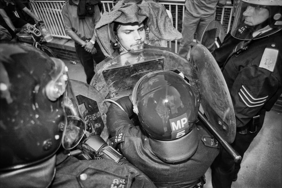 Activist Faces Police by Carlos_Grury_Santos — canvas wall art