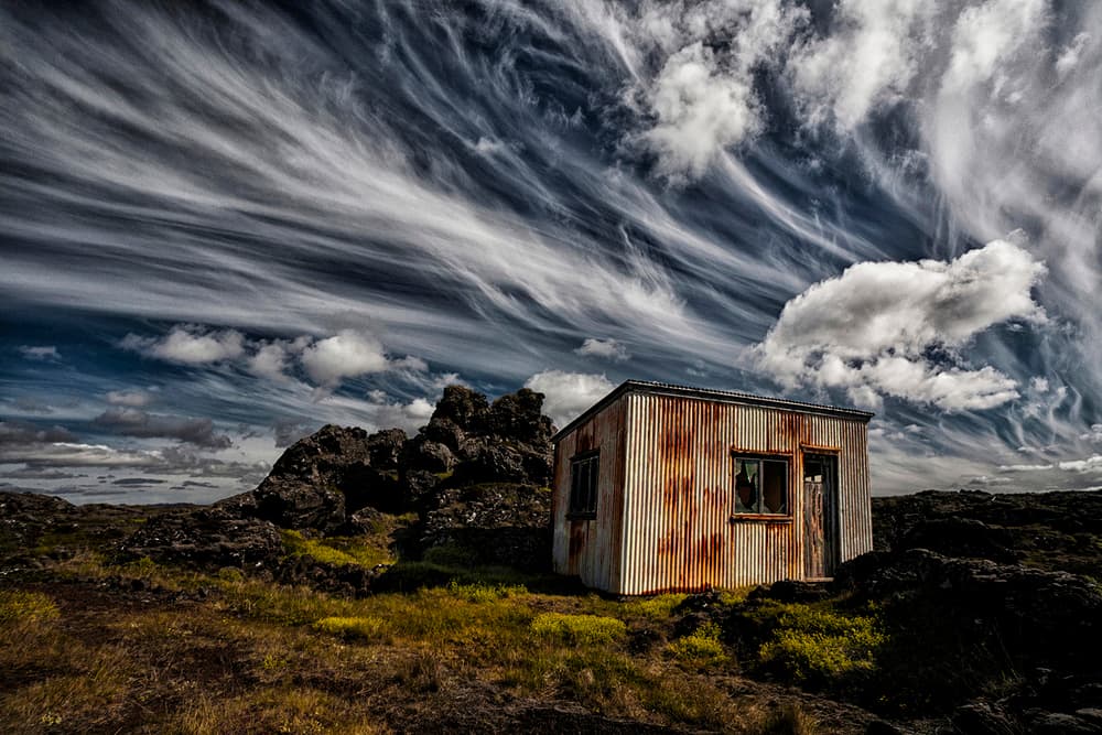 Desolate Shack Swirling Sky by Þorsteinn H. Ingibergsson — canvas wall art