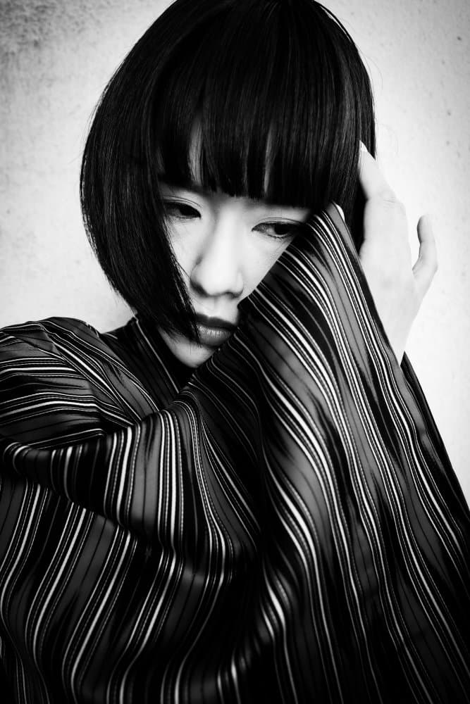 Pensive Asian Portrait by Midoriselfphoto — canvas wall art