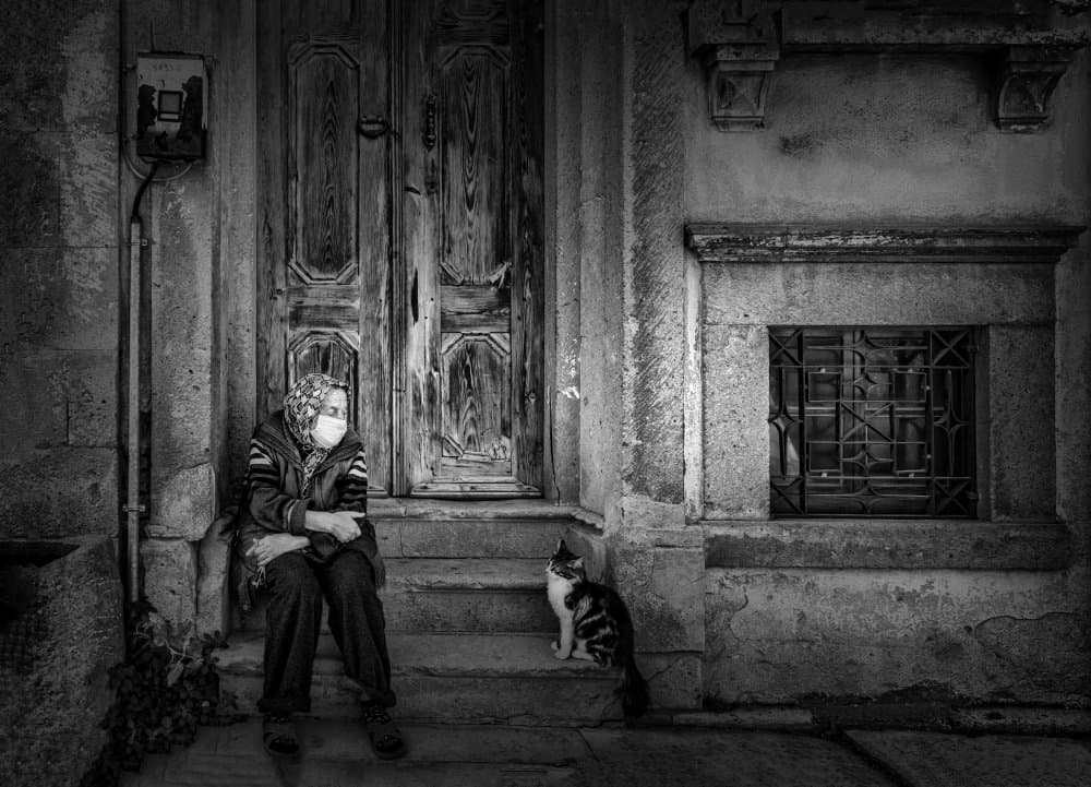 Masked Woman Stone Steps by Ömer Ates Kızıltug — canvas wall art