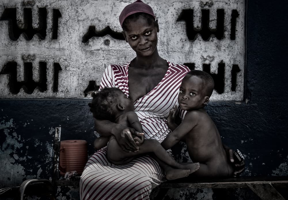 African Mother and Children by Joxe Inazio Kuesta Garmendia — canvas wall art