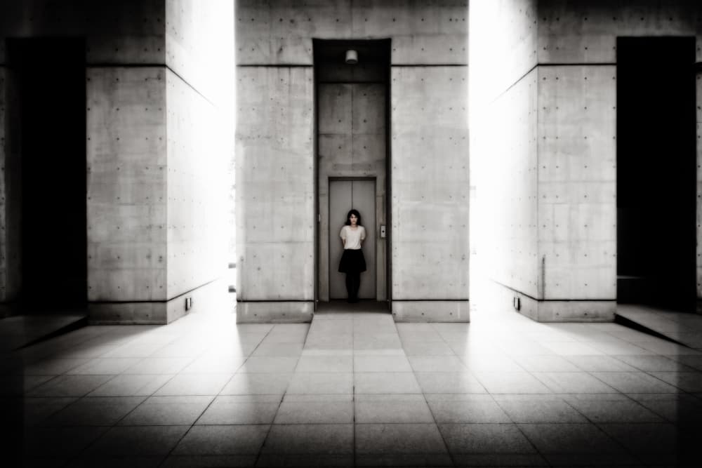 Solitary Figure Modern Hallway by Kouji Tomihisa — canvas wall art