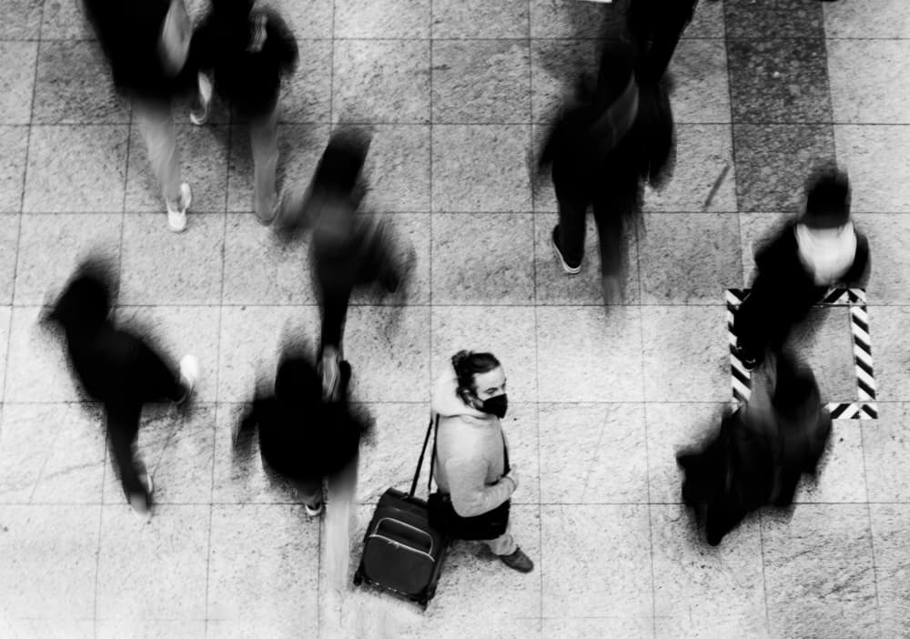 Lone Figure Amidst Motion by Adam Dauria ☂ — canvas wall art