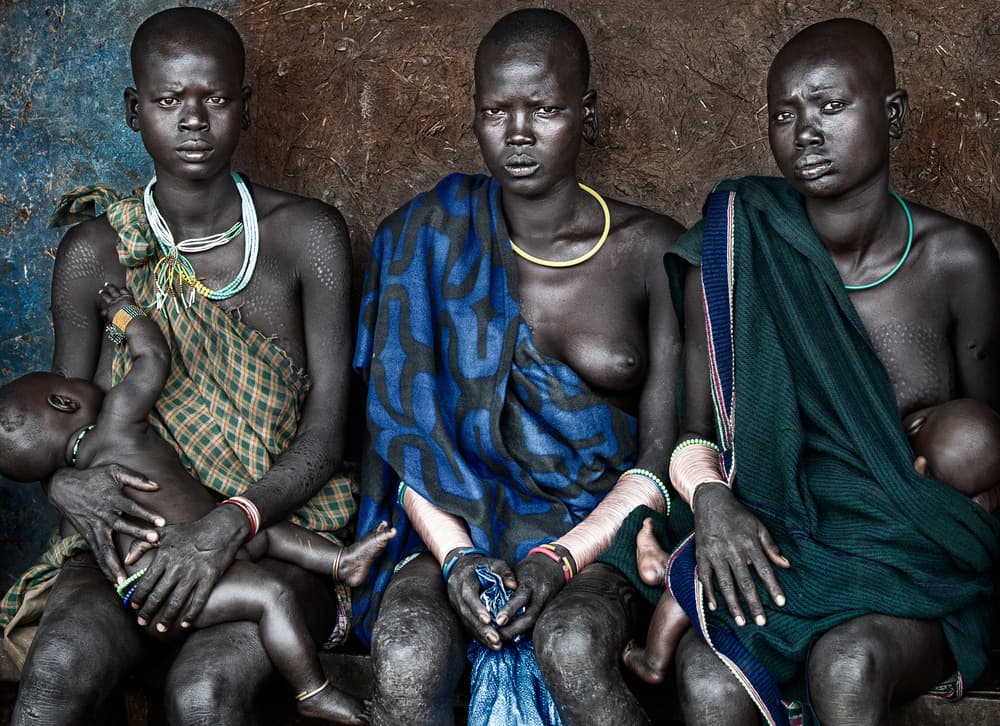Tribal Mothers And Babies by Joxe Inazio Kuesta Garmendia — canvas wall art