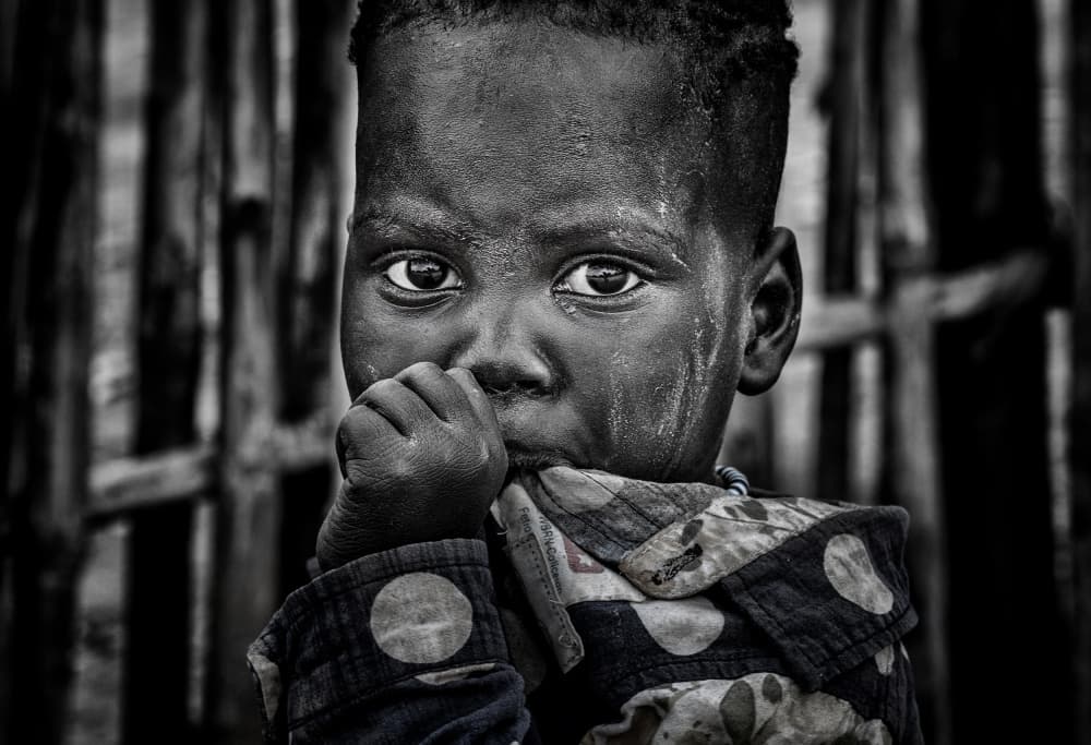 Pensive Young Boy by Joxe Inazio Kuesta Garmendia — canvas wall art