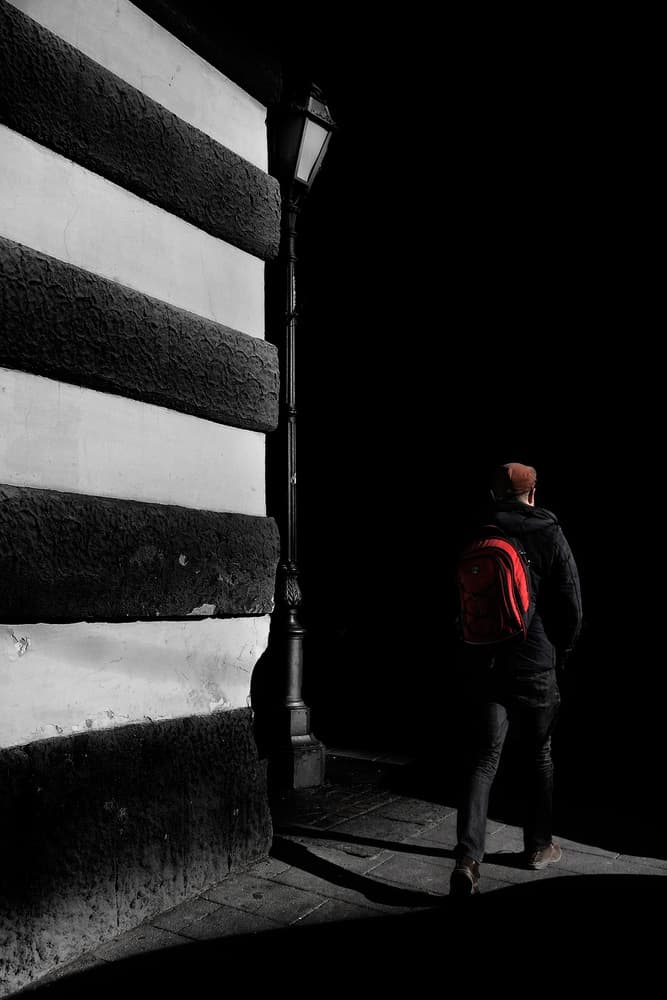 Red Backpack Dark Street by Antonio Grambone — canvas wall art