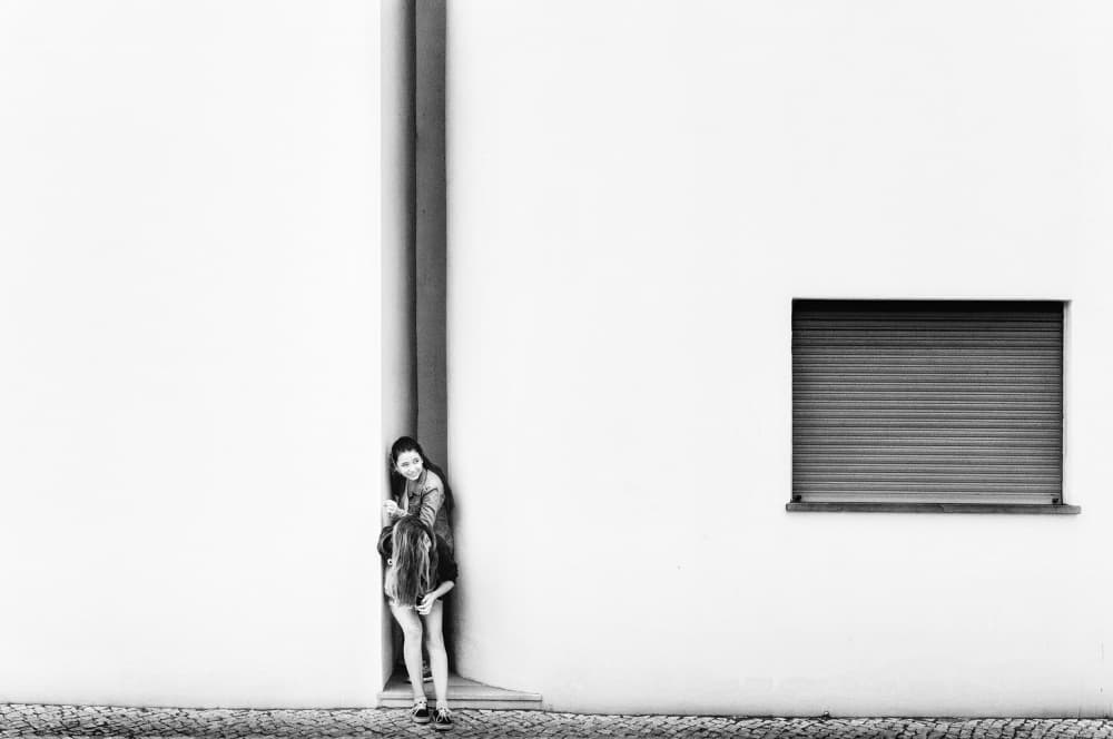 Smiling Girl White Wall by Laura Mexia — canvas wall art