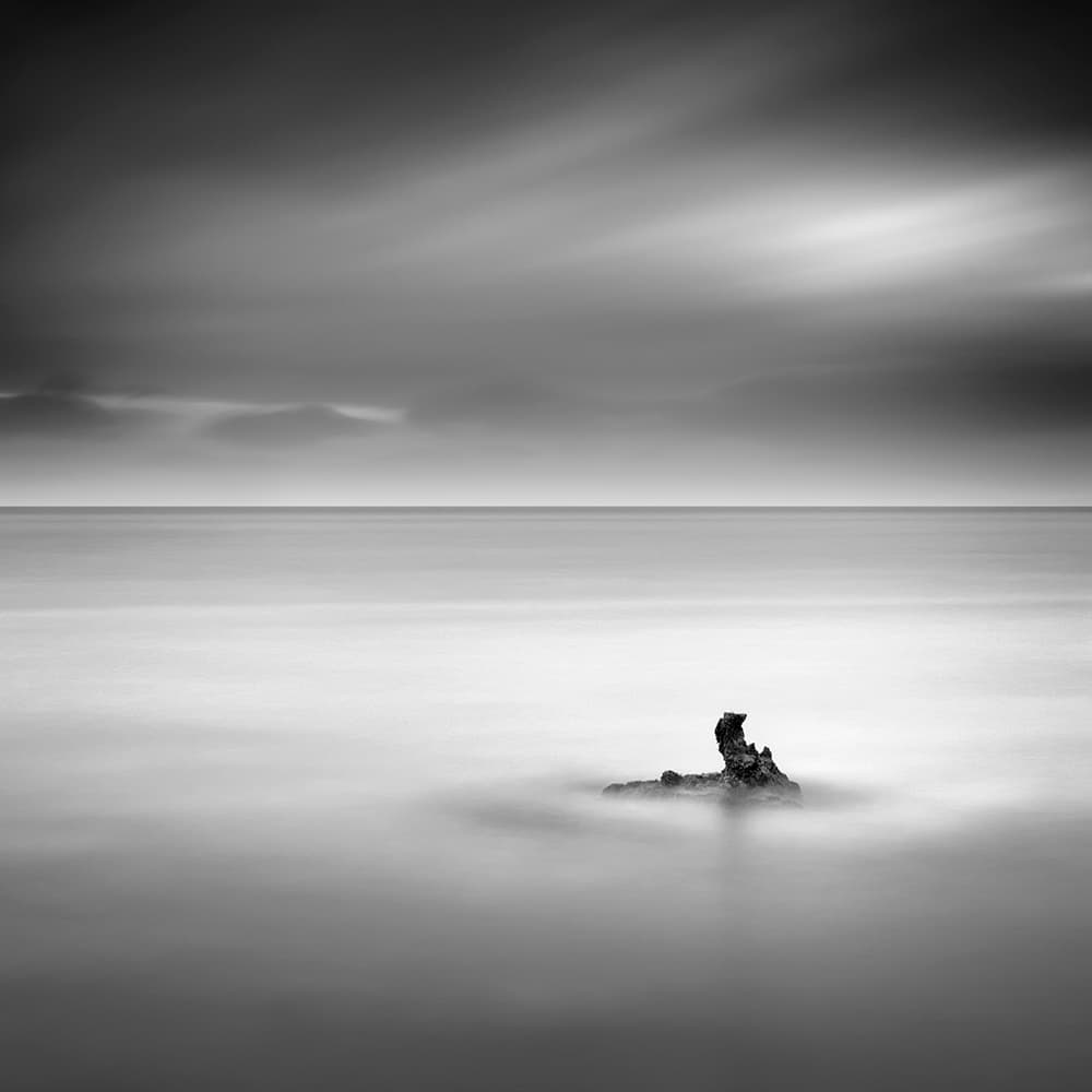 Solitary Ocean Rock by George Digalakis — canvas wall art