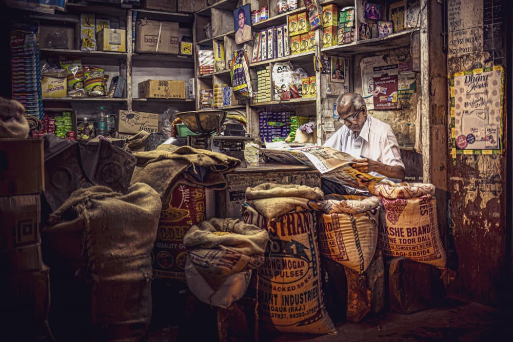 Shopkeeper's Quiet Read by Marco Tagliarino — canvas wall art