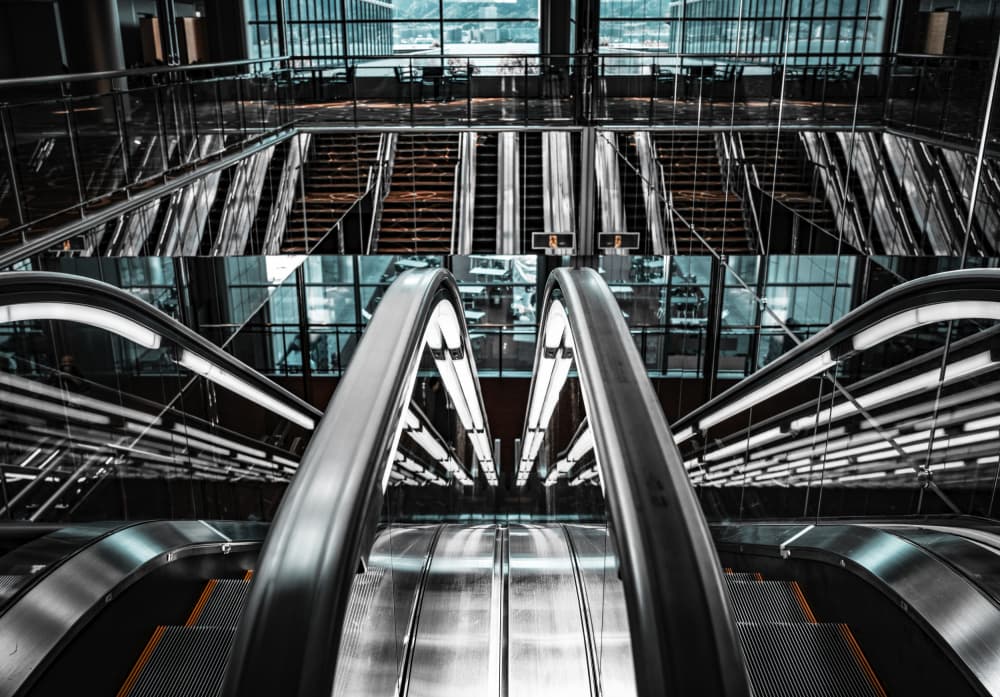 Modern Escalator Reflections by Tomoshi Hara — canvas wall art