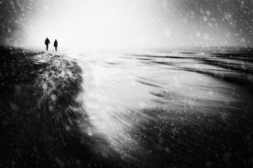 Snowy Beach Walkers by Gustav Davidsson — canvas wall art