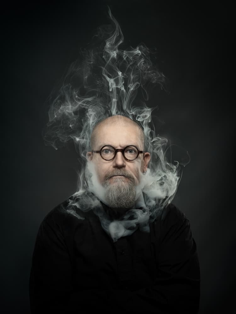 Man Amidst Smoke by Petri Damstén — canvas wall art