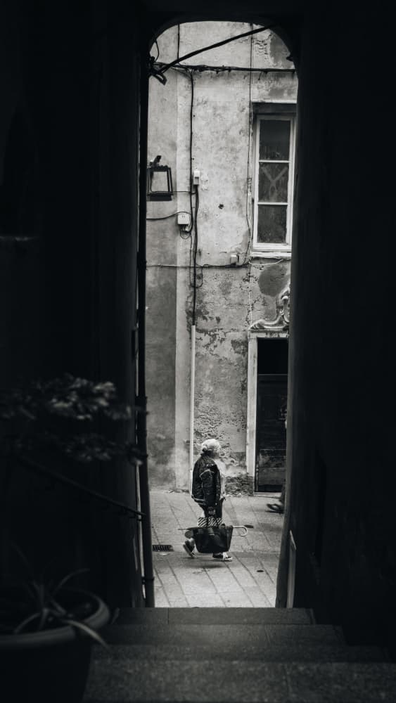 Lone Figure in Old Alley by Marcus Hennen — canvas wall art