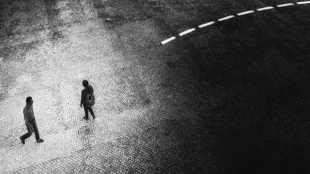 Urban Walkers in Contrast by Laura Mexia — canvas wall art