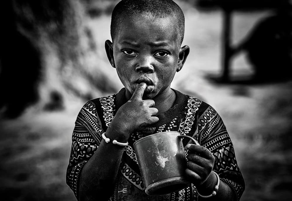 Pensive African Child by Joxe Inazio Kuesta Garmendia — canvas wall art