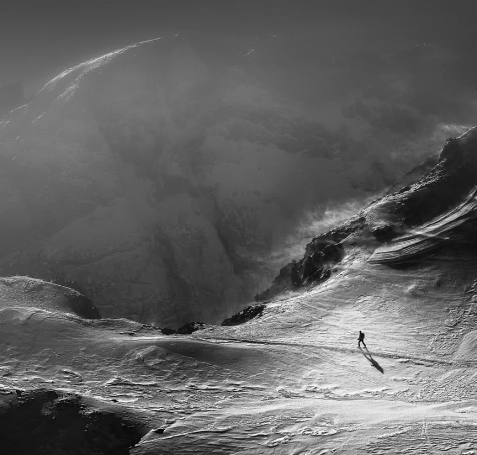 Lone Hiker Snowy Mountain by Izidor Gasperlin — canvas wall art