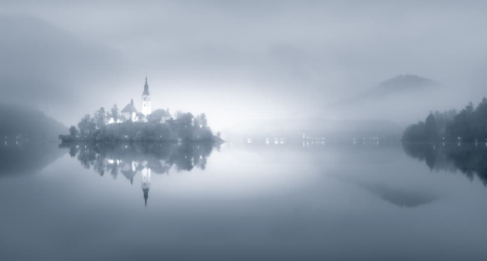 Misty Lake Bled Island by Yanny Liu — canvas wall art