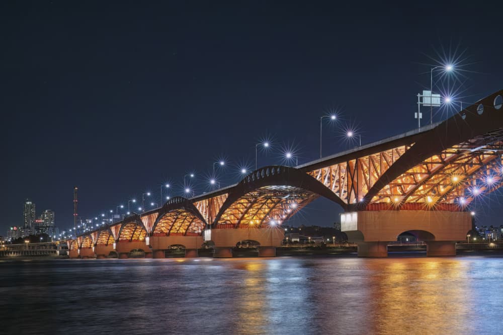 Night Bridge Glow by Tiger Seo — canvas wall art