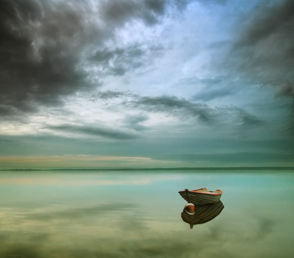Tranquil Boat Reflection by Krzysztof Browko — canvas wall art