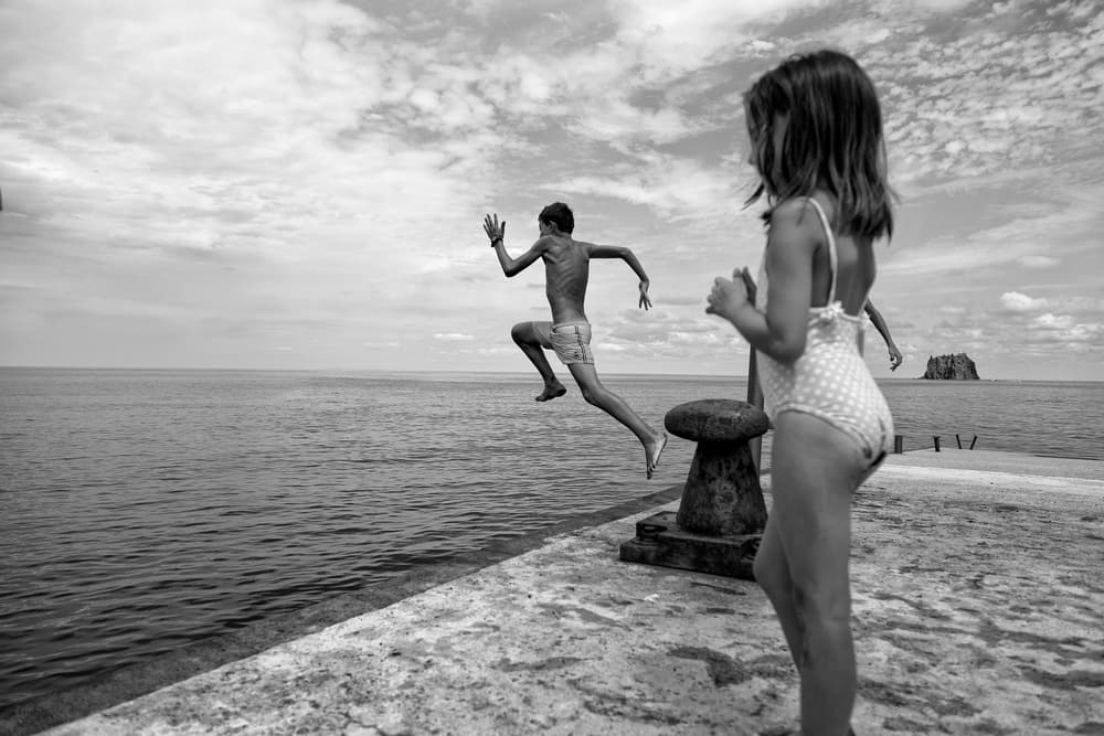 Kids Summer Ocean Jump by Lorenzo Grifantini — canvas wall art