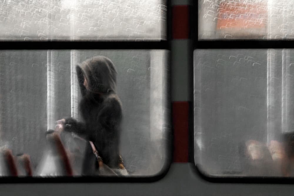 Hooded Figure Rainy Window by Gilbert Claes — canvas wall art