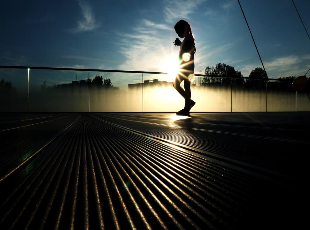 Girl in Golden Sunset by Mirela Momanu — canvas wall art