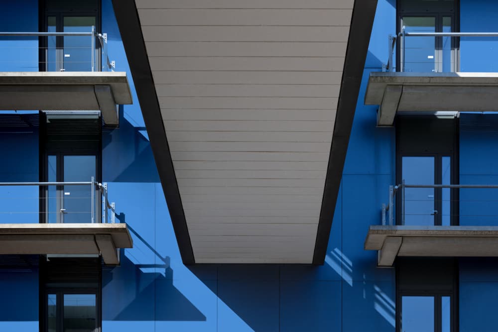 Geometric Blue Building by Theo Luycx — canvas wall art
