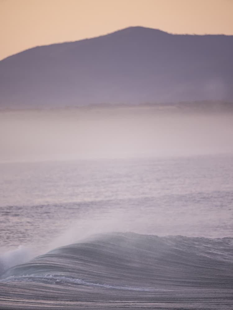 Wave Against A Misty Sunrise by Shot by Clint — canvas wall art