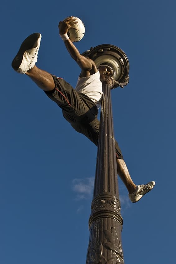 Urban Soccer Acrobat by Jure Kravanja — canvas wall art
