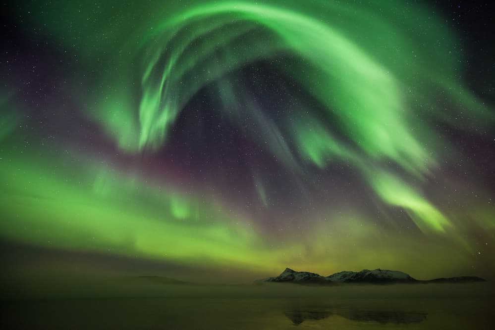 Green Aurora Mountain Reflection by Burger Jochen — canvas wall art