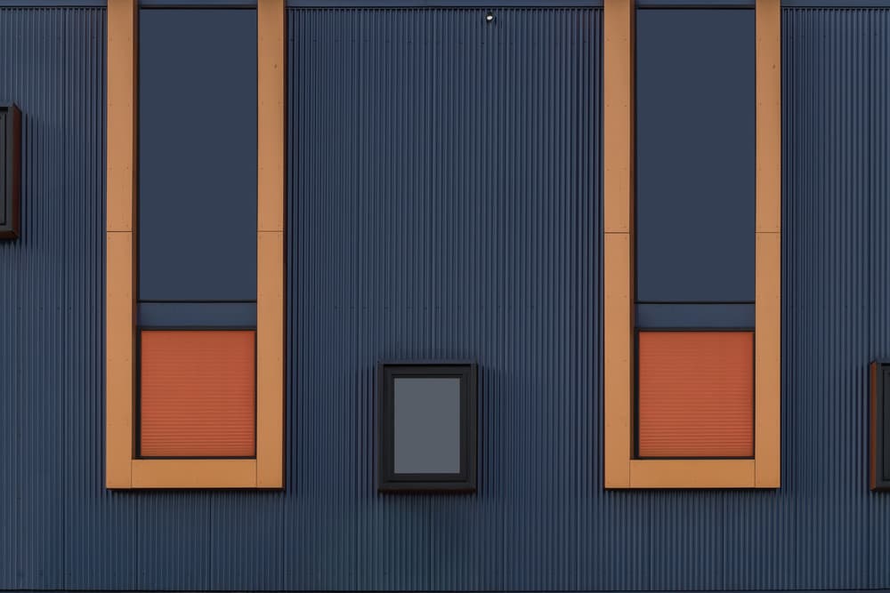 Modern Blue Orange Facade by Theo Luycx — canvas wall art
