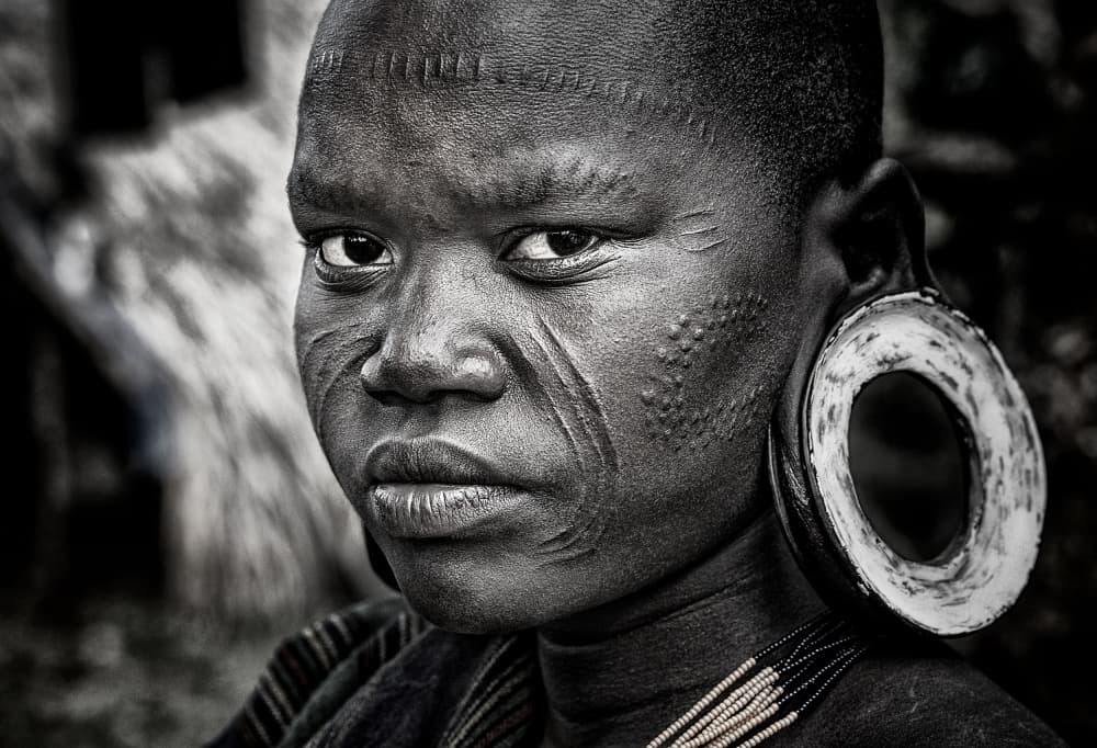 African Tribal Portrait by Joxe Inazio Kuesta Garmendia — canvas wall art