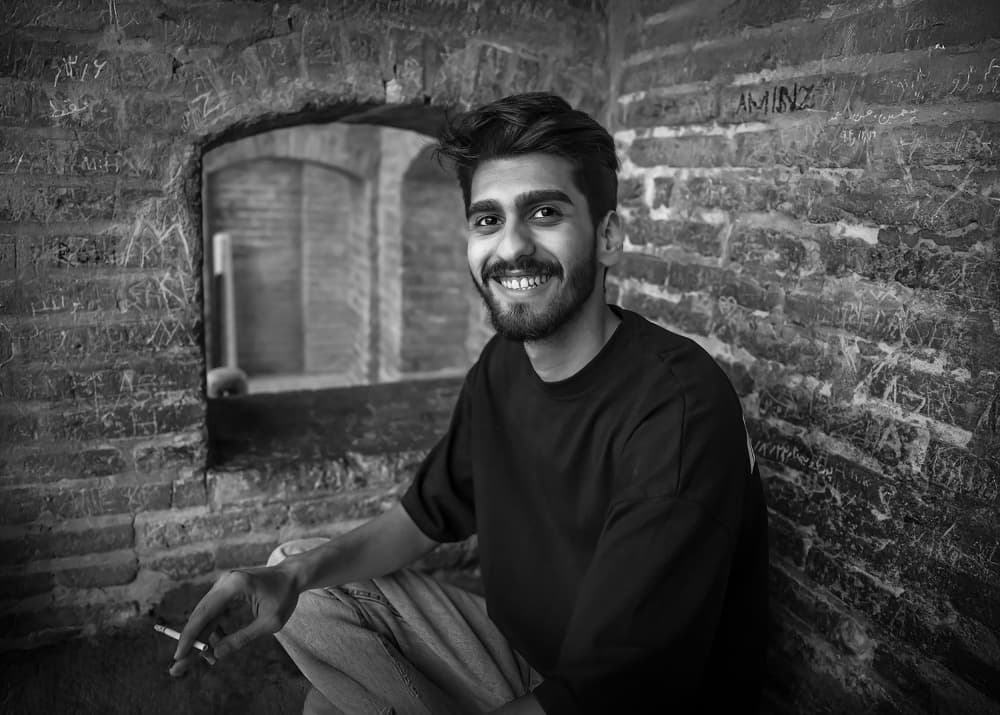 Smiling Man In Archway by Irene Wu — canvas wall art