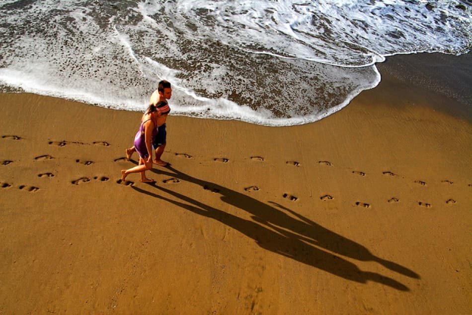 Romantic Beach Stroll by Bror Johansson — canvas wall art