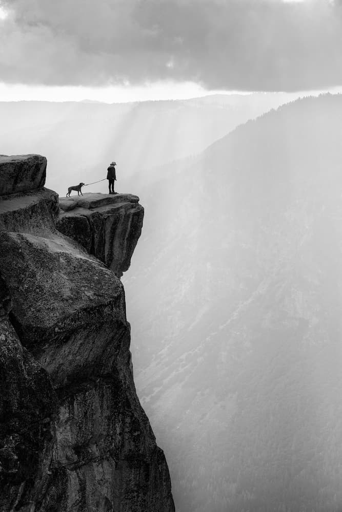 Man Dog Mountain Vista by Aidong Ning — canvas wall art