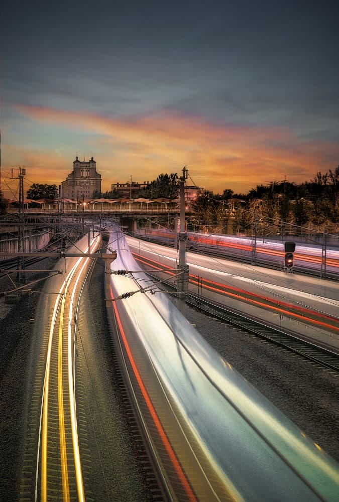 Twilight Train Trails by Juan Luis Seco — canvas wall art