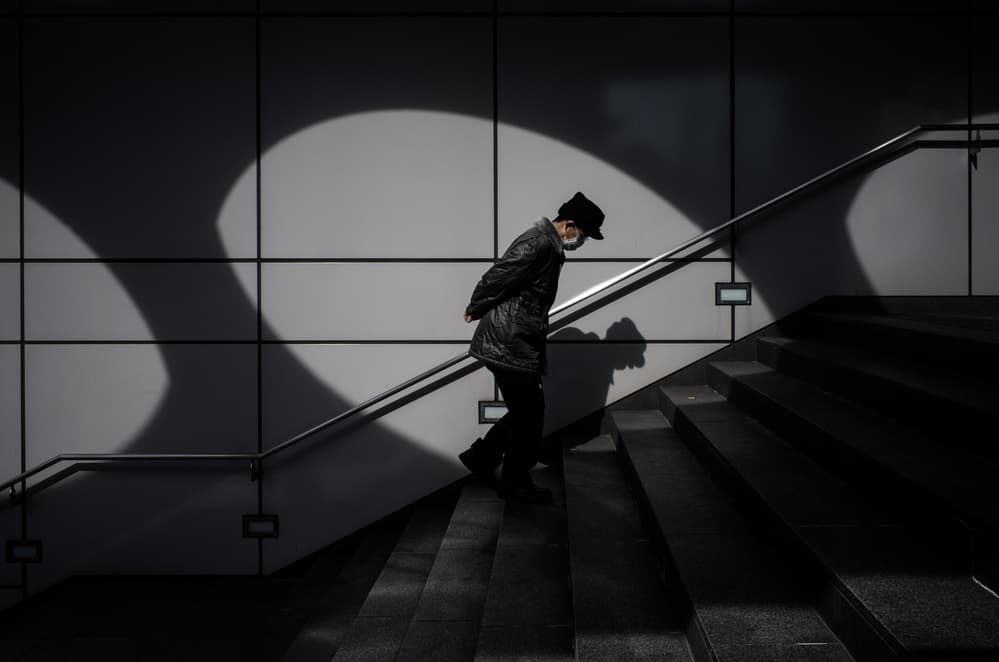 Man on Urban Stairs by Tetsuya Hashimoto — canvas wall art