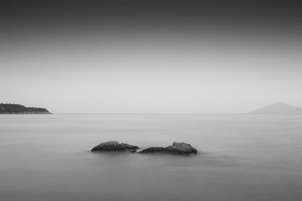 Serene Sea Rocks by Catalin Baican — canvas wall art