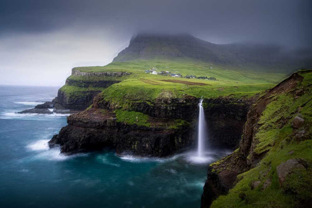 Misty Cliffside Waterfall by Dennis Zhang — canvas wall art