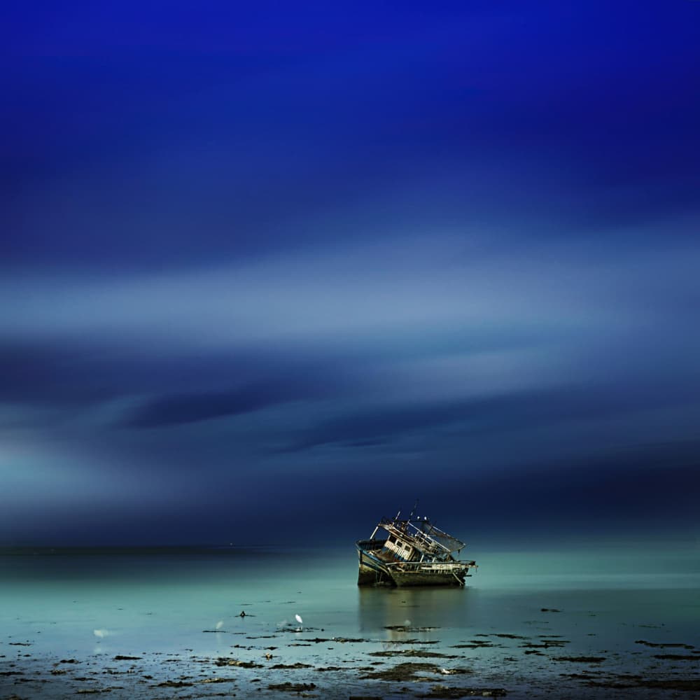 Calm Water Shipwreck by Saskia Dingemans — canvas wall art