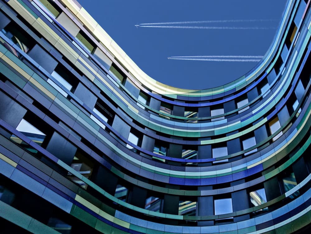 Wavy Building Blue Sky by Burghard Nitzschmann — canvas wall art