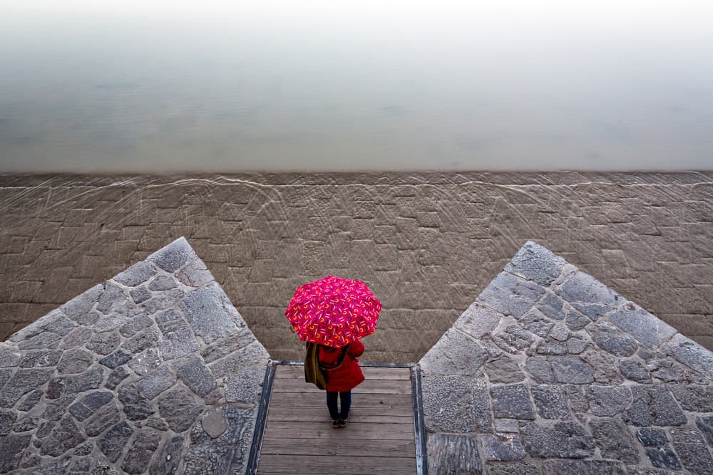 Pink Umbrella Water View by Mohammadreza Momeni — canvas wall art