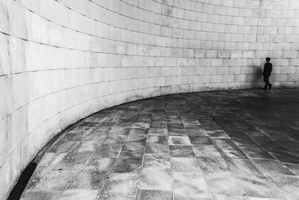Lone Figure Curved Wall by Milena Seita — canvas wall art
