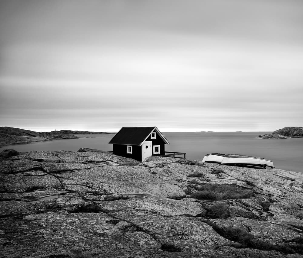 Rocky Coast House by Christian Lindsten — canvas wall art