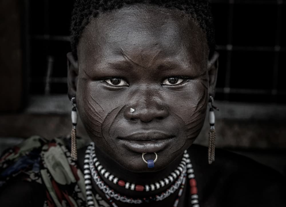 African Woman's Gaze by Joxe Inazio Kuesta Garmendia — canvas wall art